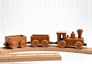 Wooden toy train set with mountains